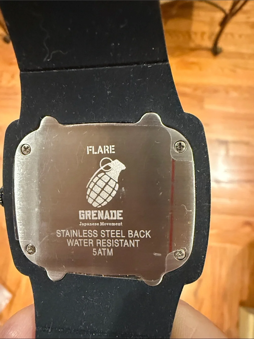 Black Silicone Smartwatch with Green Dial Accent